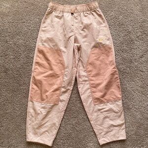 Nike sportswear swoosh curve trousers women’s size small. Light pink.